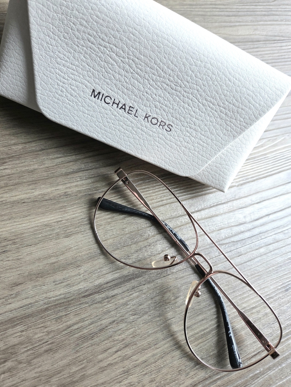 Michael Kors MK3019 Procidais a women's Rose Gold Aviator-Style Metal Glasses